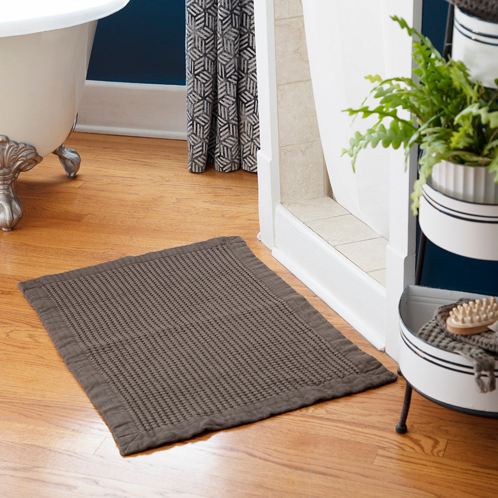 Modern style waffle bath mat in a new moody stone color