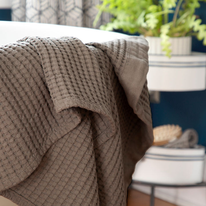 Modern style waffle bath towels in a new moody stone color