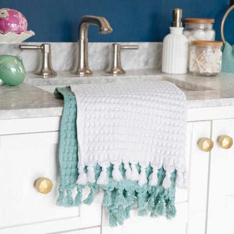 Modern Waffle Tassel Hand Towels layered white and seafoam.