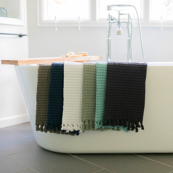 Modern Waffle Tassel Hand Towels in a variety of colors to match any bathroom decor.
