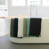 Modern Waffle Tassel Hand Towels in a variety of colors to match any bathroom decor.
