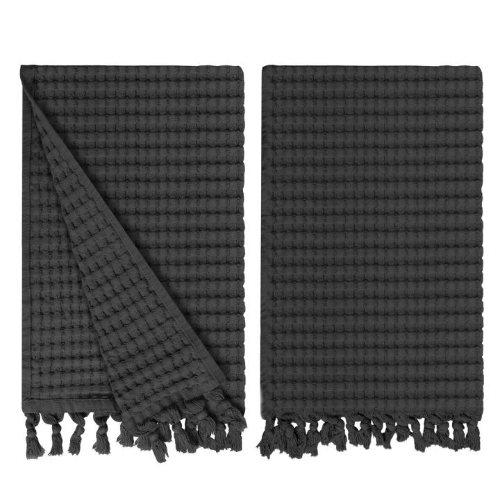Gilden Tree waffle hand towels for bathrooms with new decorative tassels shows a folded towel.