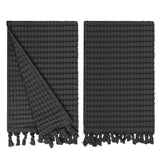 Gilden Tree waffle hand towels for bathrooms with new decorative tassels shows a folded towel.