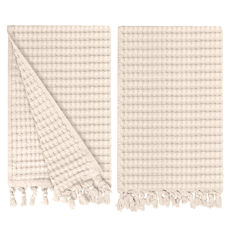 Gilden Tree waffle hand towels for bathrooms with new decorative tassels shows a folded towel.