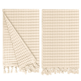 Gilden Tree waffle hand towels for bathrooms with new decorative tassels shows a folded towel.