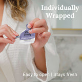 Person holding a shower steamers package with text 'Individually Wrapped', 'Easy to open', and 'Stays fresh'.