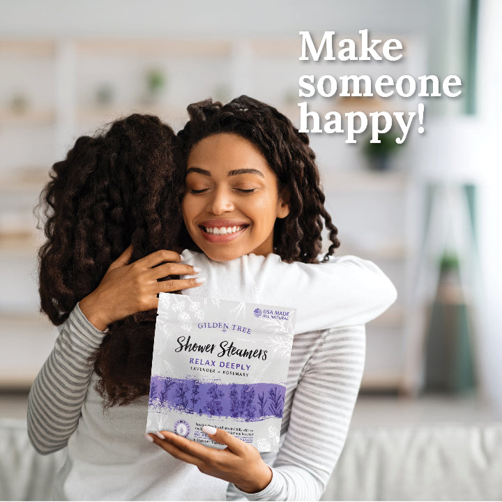 Young girl hugging her mom after gifting her a Relax Deeply shower steamer gift bag.