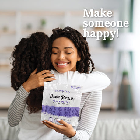 Young girl hugging her mom after gifting her a Relax Deeply shower steamer gift bag.