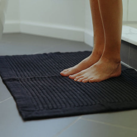 Faded Black waffle bath mat is striking in any bathroom