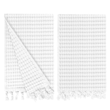 Gilden Tree waffle hand towels for bathrooms with new decorative tassels shows a folded towel.