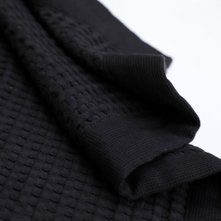 Faded Black waffle bathmat is super quick-drying both after use and in the dryer.