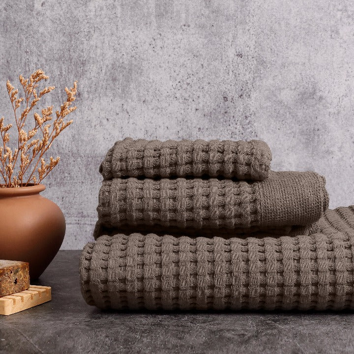Modern style waffle bath towels in a new moody stone color